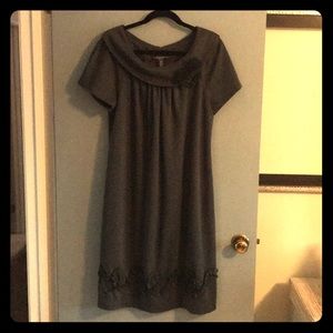 Grey Dress with details.